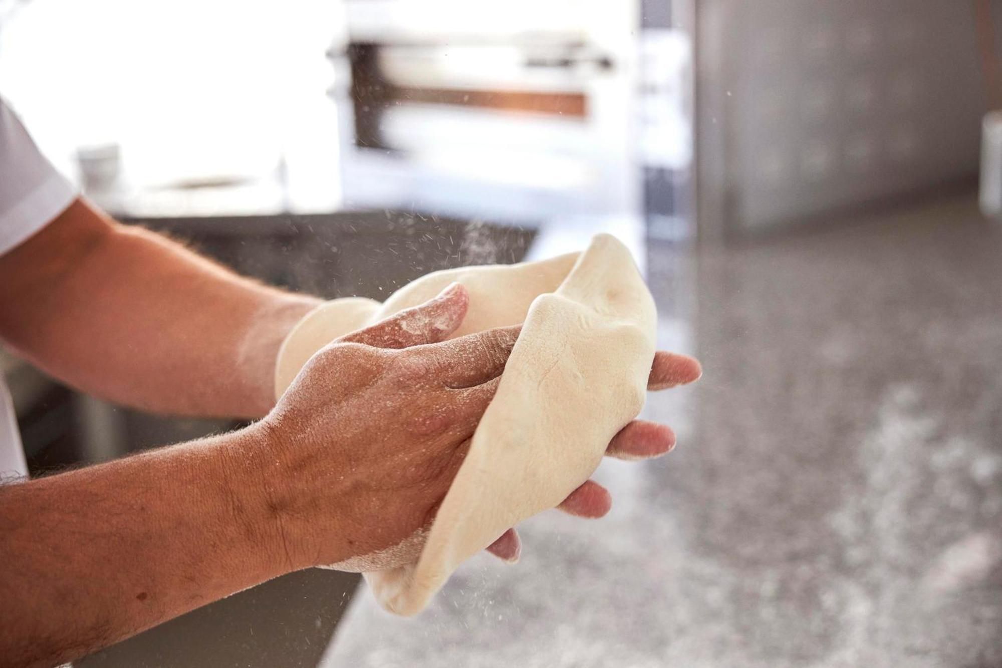 Monchique Resort & Spa Exterior foto A baker kneading bread dough